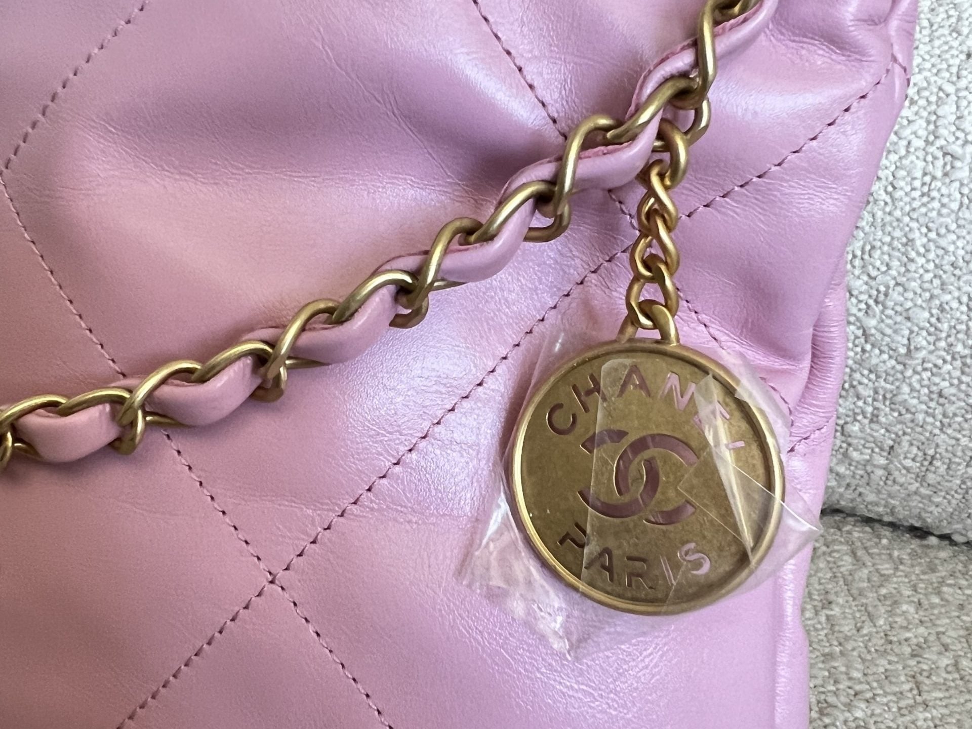 CHANEL Handbag Chanel 22 Pink Shiny Calfskin Quilted Drawstring Bag Small GHW - Redeluxe