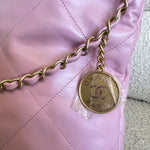 CHANEL Handbag Chanel 22 Pink Shiny Calfskin Quilted Drawstring Bag Small GHW - Redeluxe