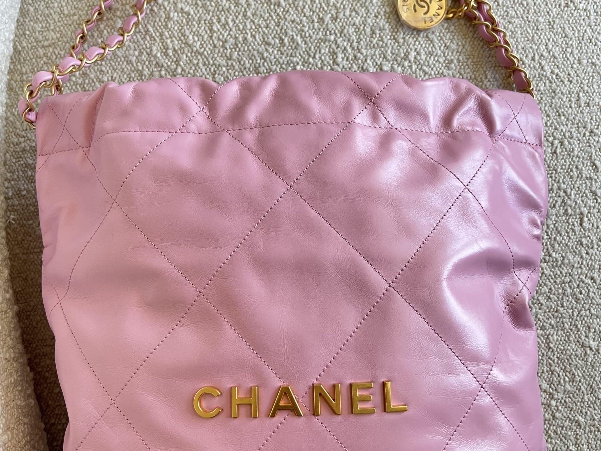 CHANEL Handbag Chanel 22 Pink Shiny Calfskin Quilted Drawstring Bag Small GHW - Redeluxe