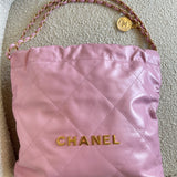 CHANEL Handbag Chanel 22 Pink Shiny Calfskin Quilted Drawstring Bag Small GHW - Redeluxe