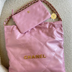 CHANEL Handbag Chanel 22 Pink Shiny Calfskin Quilted Drawstring Bag Small GHW - Redeluxe