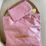 CHANEL Handbag Chanel 22 Pink Shiny Calfskin Quilted Drawstring Bag Small GHW - Redeluxe