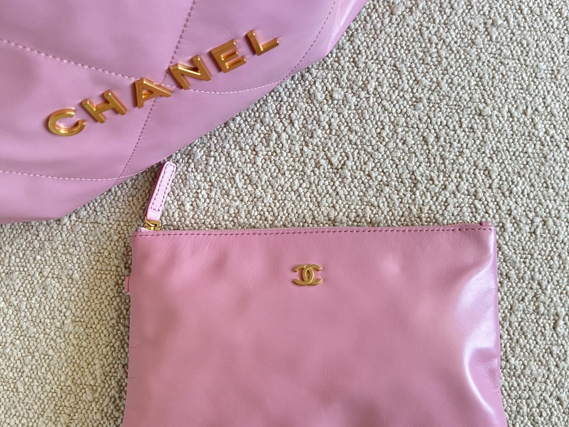 CHANEL Handbag Chanel 22 Pink Shiny Calfskin Quilted Drawstring Bag Small GHW - Redeluxe