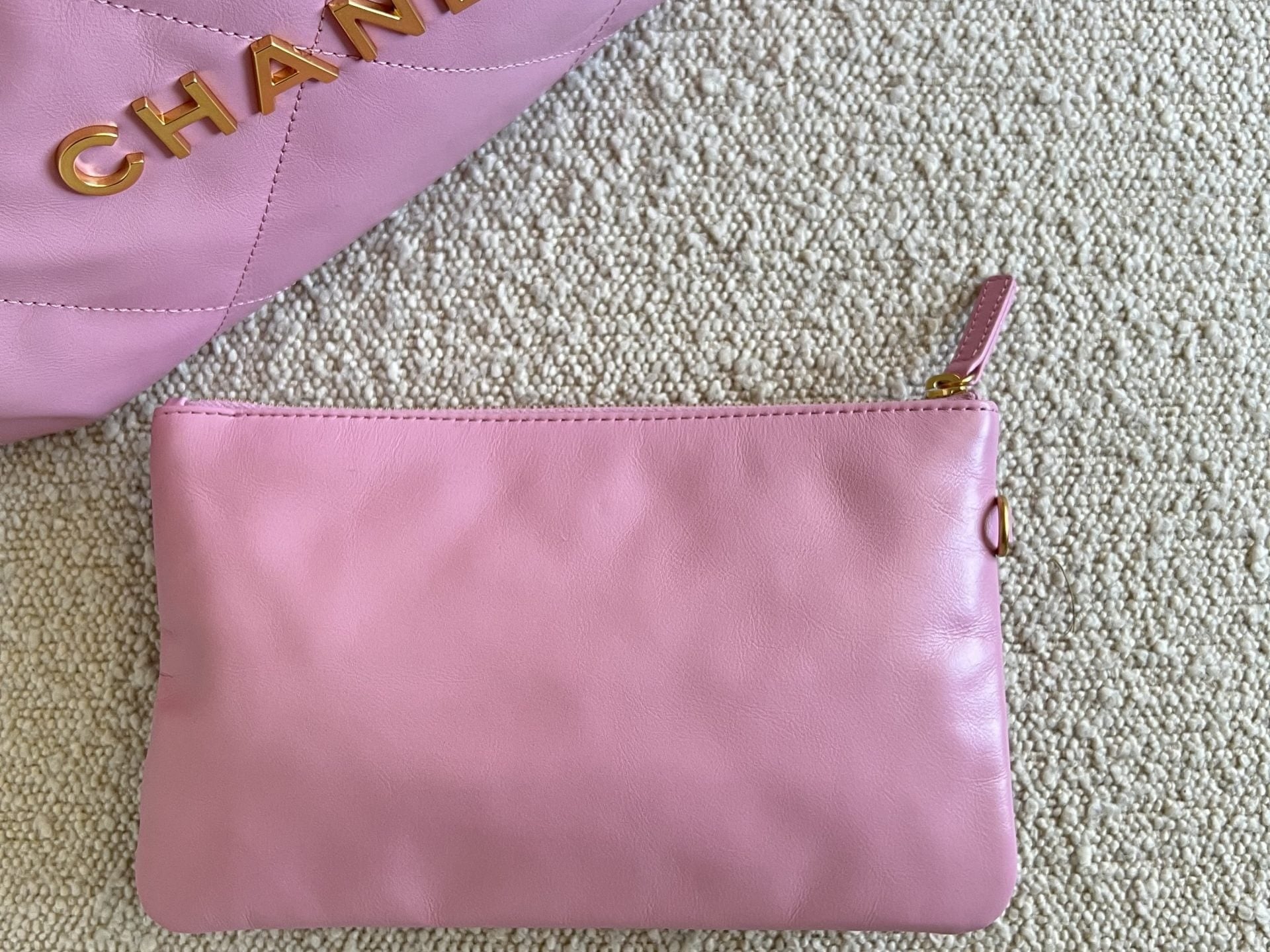 CHANEL Handbag Chanel 22 Pink Shiny Calfskin Quilted Drawstring Bag Small GHW - Redeluxe