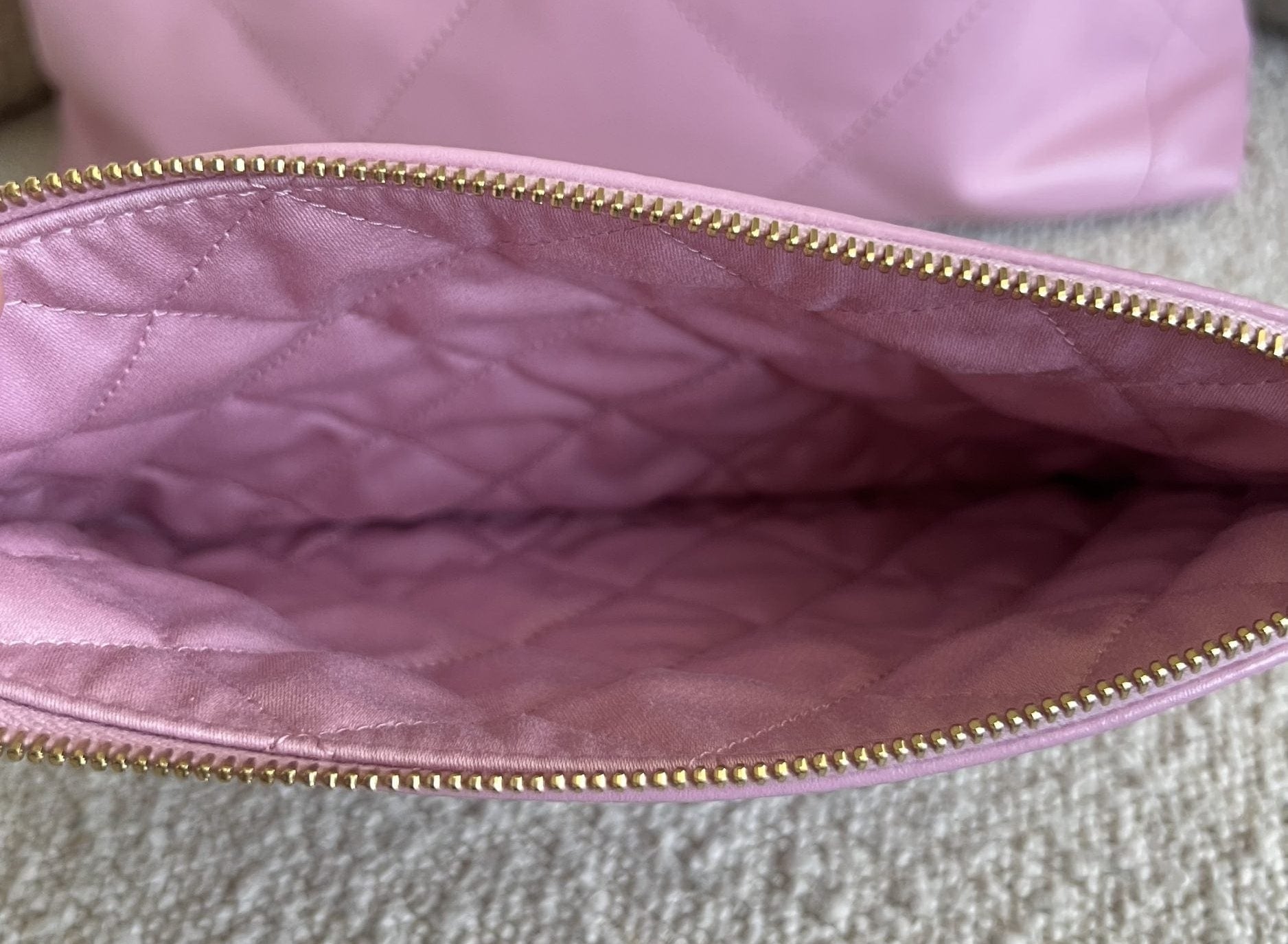 CHANEL Handbag Chanel 22 Pink Shiny Calfskin Quilted Drawstring Bag Small GHW - Redeluxe