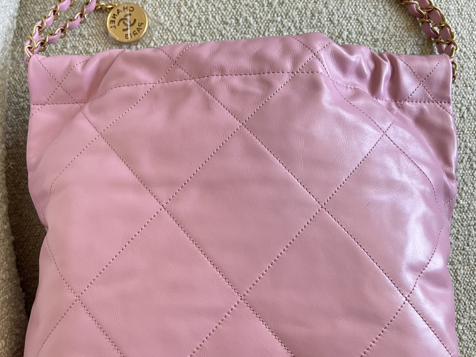 CHANEL Handbag Chanel 22 Pink Shiny Calfskin Quilted Drawstring Bag Small GHW - Redeluxe