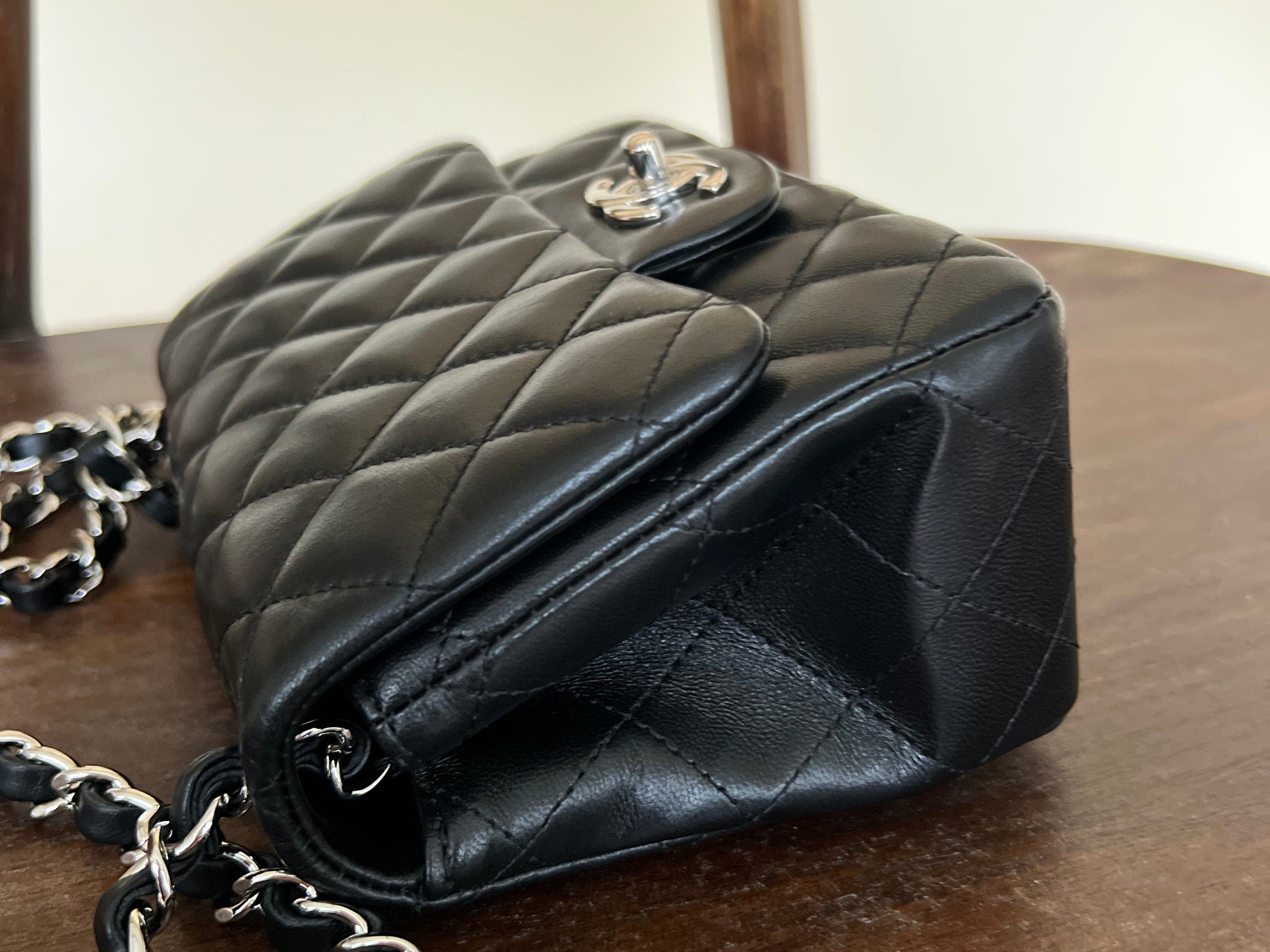 CHANEL Handbag CHANEL BLACK MINI SQUARE LAMBSKIN QUILTED FLAP SILVER HARDWARE - Redeluxe