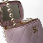 CHANEL Handbag Pink Light Pink Lambskin Quilted Mini Vanity Case With Pearl Chain - Redeluxe