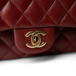 CHANEL Handbag Red 18C Dark Red Glittery Caviar Quilted Classic Flap Aged Gold Hardware - Redeluxe