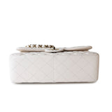CHANEL Handbag White 21S Jumbo White Caviar Quilted Classic Flap Light Gold Hardware - Redeluxe