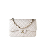 CHANEL Handbag White 21S Jumbo White Caviar Quilted Classic Flap Light Gold Hardware - Redeluxe