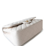 CHANEL Handbag White 21S Jumbo White Caviar Quilted Classic Flap Light Gold Hardware - Redeluxe