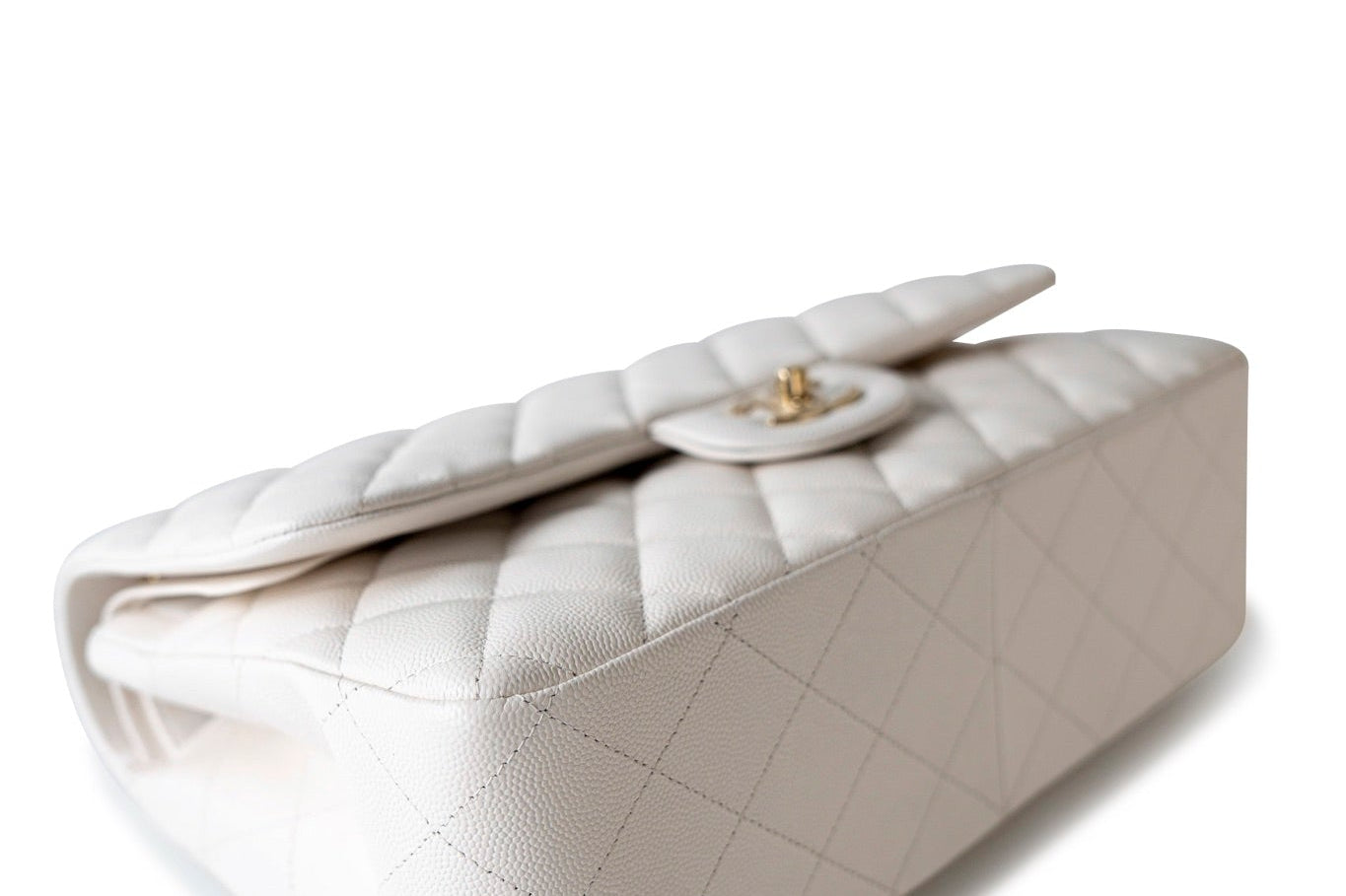 CHANEL Handbag White 21S Jumbo White Caviar Quilted Classic Flap Light Gold Hardware - Redeluxe