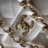 CHANEL Handbag White 21S Jumbo White Caviar Quilted Classic Flap Light Gold Hardware - Redeluxe