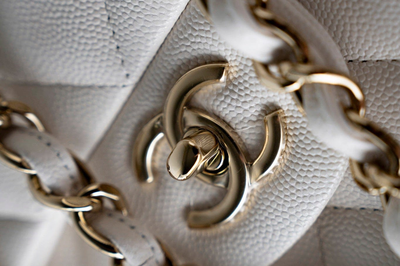 CHANEL Handbag White 21S Jumbo White Caviar Quilted Classic Flap Light Gold Hardware - Redeluxe