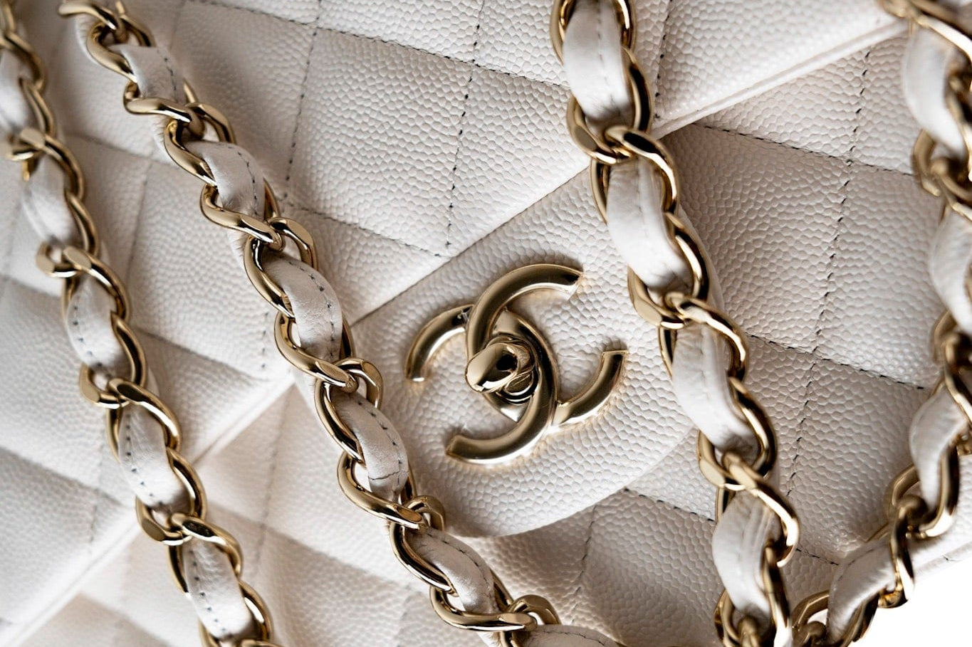 CHANEL Handbag White 21S Jumbo White Caviar Quilted Classic Flap Light Gold Hardware - Redeluxe