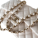 CHANEL Handbag White 21S Jumbo White Caviar Quilted Classic Flap Light Gold Hardware - Redeluxe