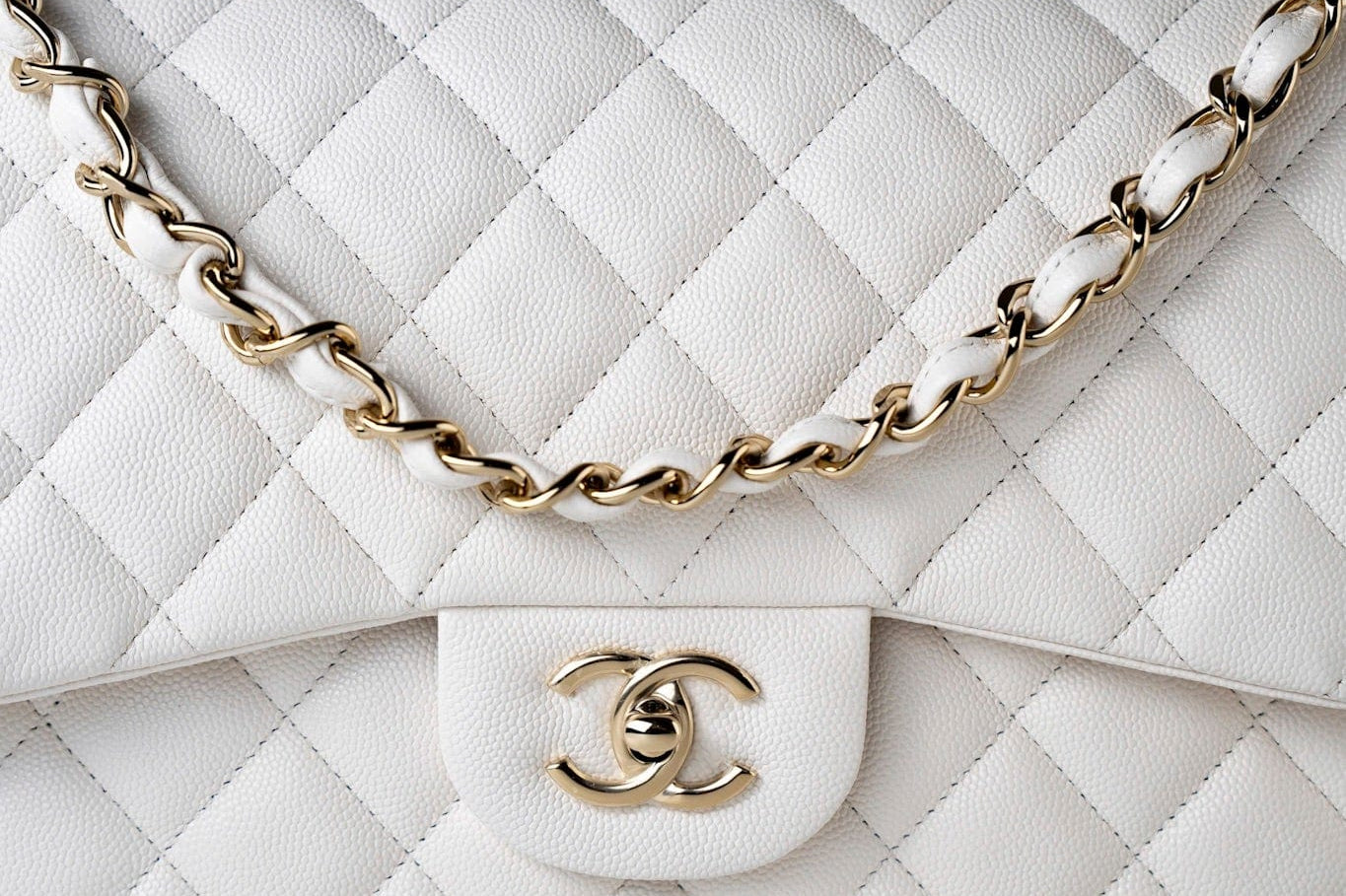 CHANEL Handbag White 21S Jumbo White Caviar Quilted Classic Flap Light Gold Hardware - Redeluxe