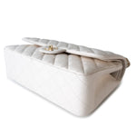 CHANEL Handbag White 21S Jumbo White Caviar Quilted Classic Flap Light Gold Hardware - Redeluxe