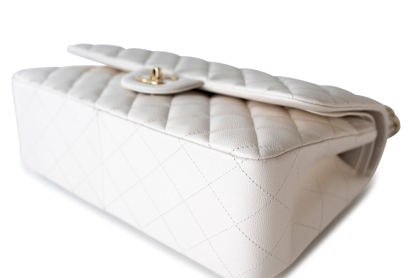 CHANEL Handbag White 21S Jumbo White Caviar Quilted Classic Flap Light Gold Hardware - Redeluxe