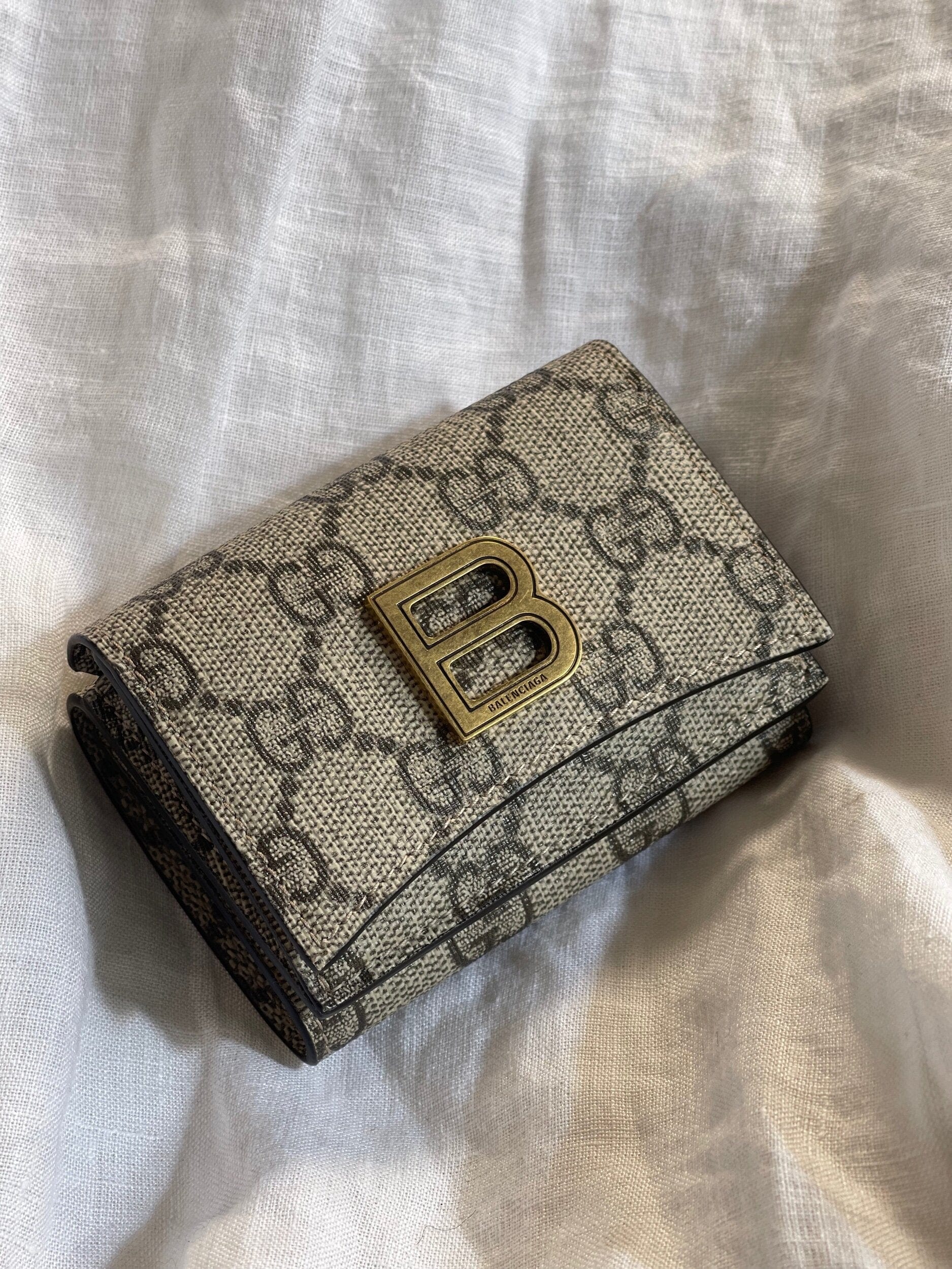 小物 Gucci card case GG Emblem card case with strap in beige and dark brown