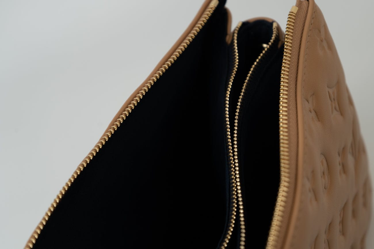 Louis Vuitton Handbag Brown Louis Vuitton Monogram Coussin PM Camel Lambskin Embossed - Redeluxe