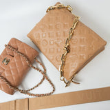 Louis Vuitton Handbag Brown Louis Vuitton Monogram Coussin PM Camel Lambskin Embossed - Redeluxe
