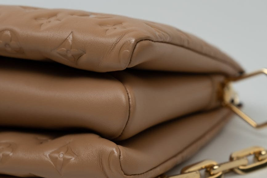 Louis Vuitton Handbag Brown Louis Vuitton Monogram Coussin PM Camel Lambskin Embossed - Redeluxe