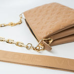Louis Vuitton Handbag Brown Louis Vuitton Monogram Coussin PM Camel Lambskin Embossed - Redeluxe
