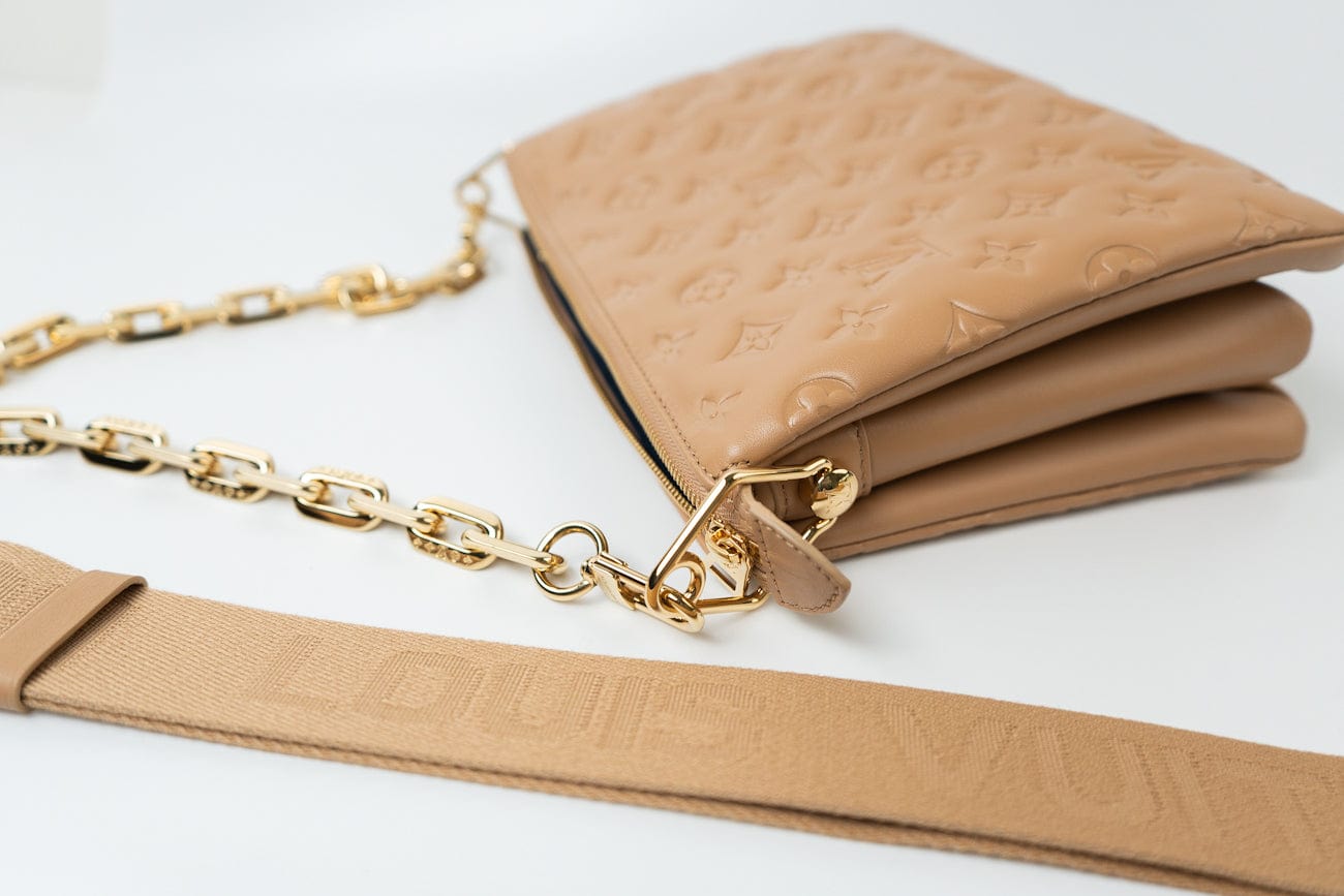 Louis Vuitton Handbag Brown Louis Vuitton Monogram Coussin PM Camel Lambskin Embossed - Redeluxe