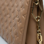 Louis Vuitton Handbag Brown Louis Vuitton Monogram Coussin PM Camel Lambskin Embossed - Redeluxe