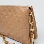 Louis Vuitton Handbag Brown Louis Vuitton Monogram Coussin PM Camel Lambskin Embossed - Redeluxe