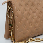 Louis Vuitton Handbag Brown Louis Vuitton Monogram Coussin PM Camel Lambskin Embossed - Redeluxe