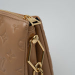 Louis Vuitton Handbag Brown Louis Vuitton Monogram Coussin PM Camel Lambskin Embossed - Redeluxe