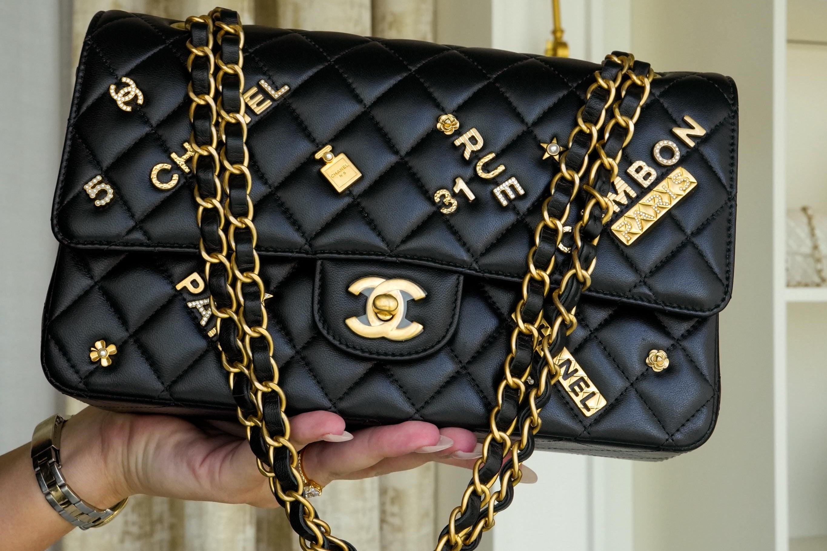 Product image 10 of 16: 21S Black Lambskin Quilted Rue Cambon Charms Classic Flap Medium AGHW