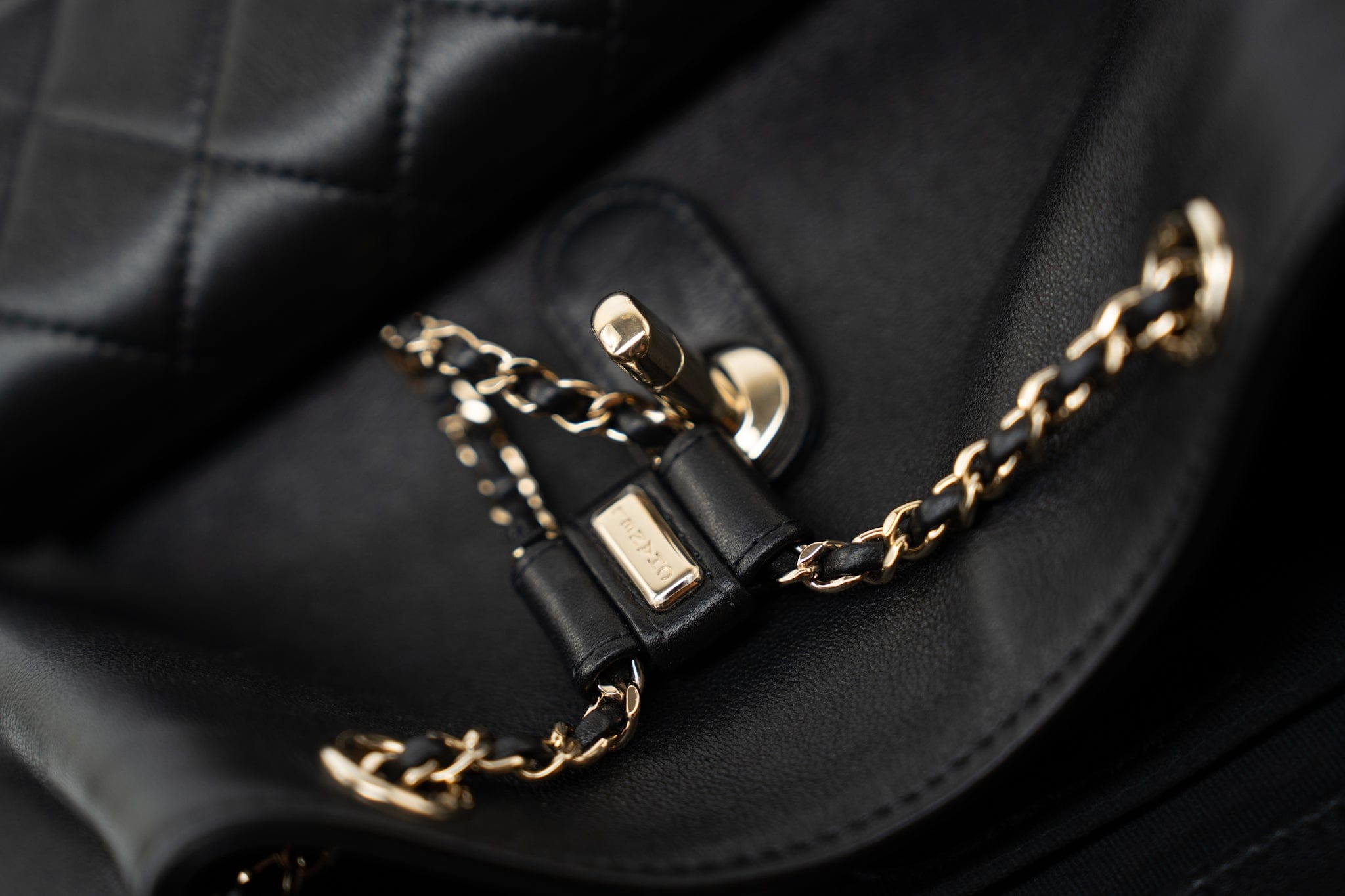 CHANEL Backpack Duma Backpack Large Black Lambskin Quilted - Redeluxe