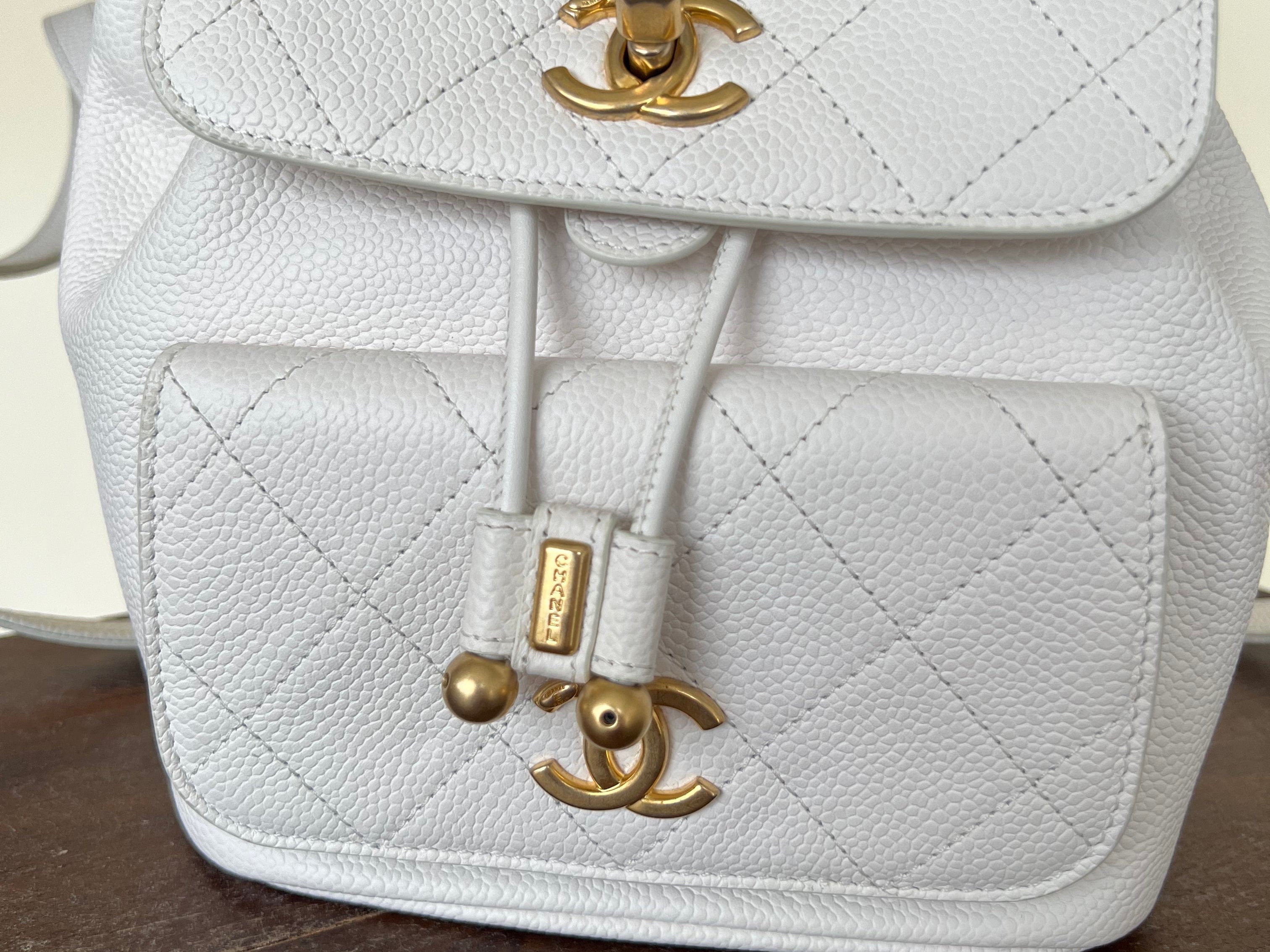 CHANEL Backpack White Caviar Quilted BackPack w/ Aged Gold Hardware - Redeluxe