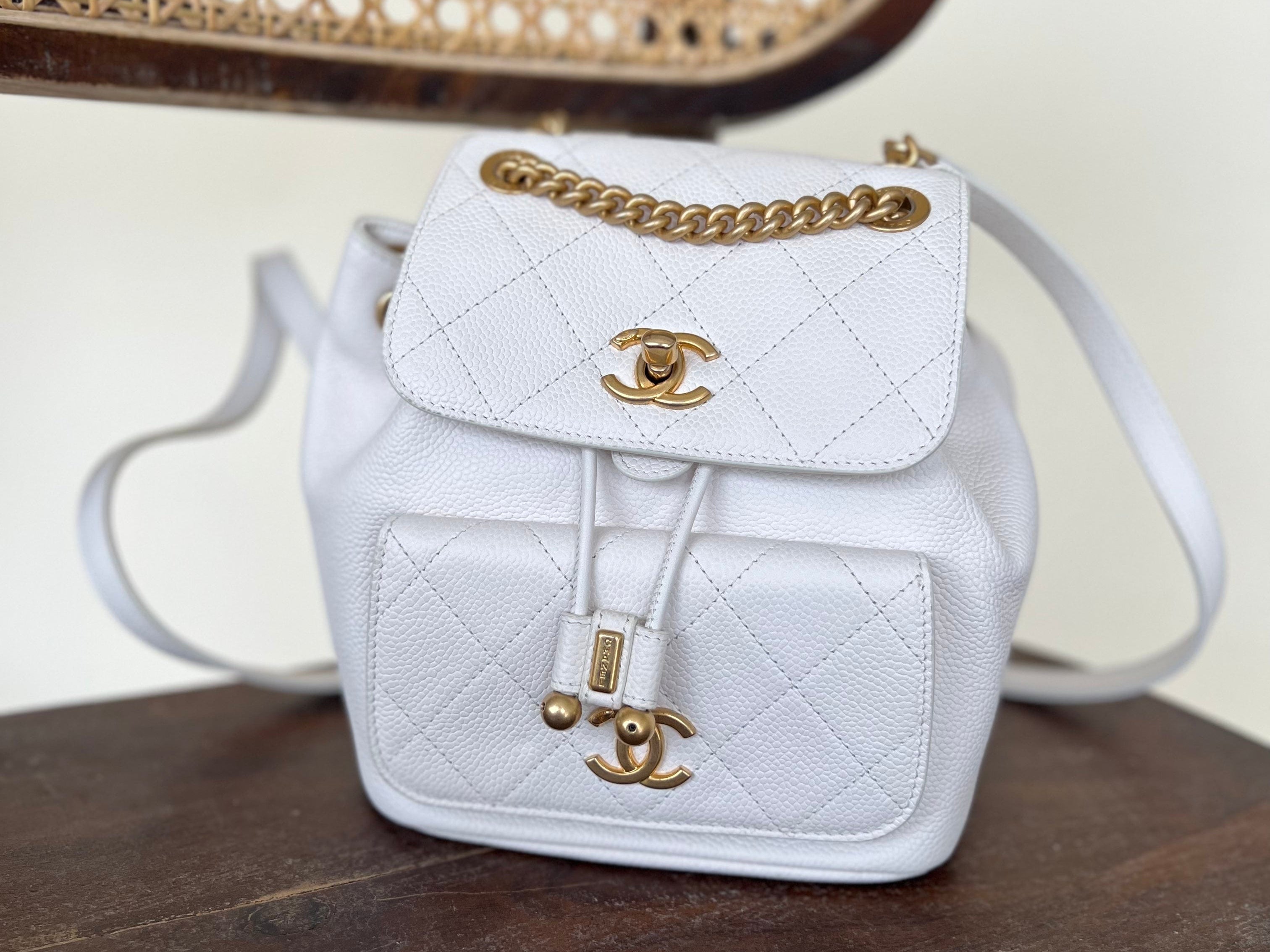 CHANEL Backpack White Caviar Quilted BackPack w/ Aged Gold Hardware - Redeluxe