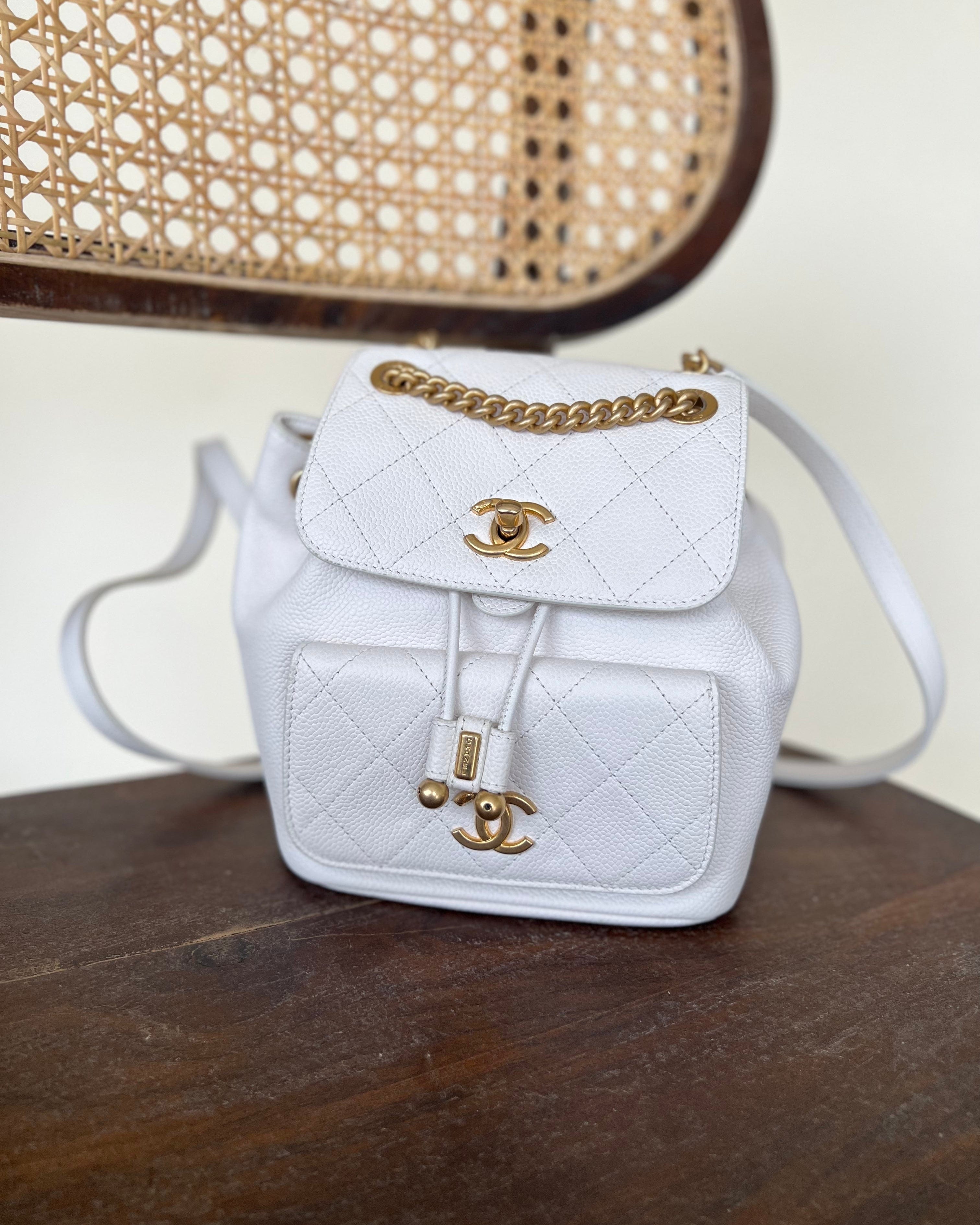 CHANEL Backpack White Caviar Quilted BackPack w/ Aged Gold Hardware - Redeluxe