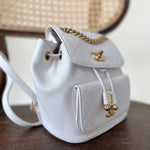 CHANEL Backpack White Caviar Quilted BackPack w/ Aged Gold Hardware - Redeluxe