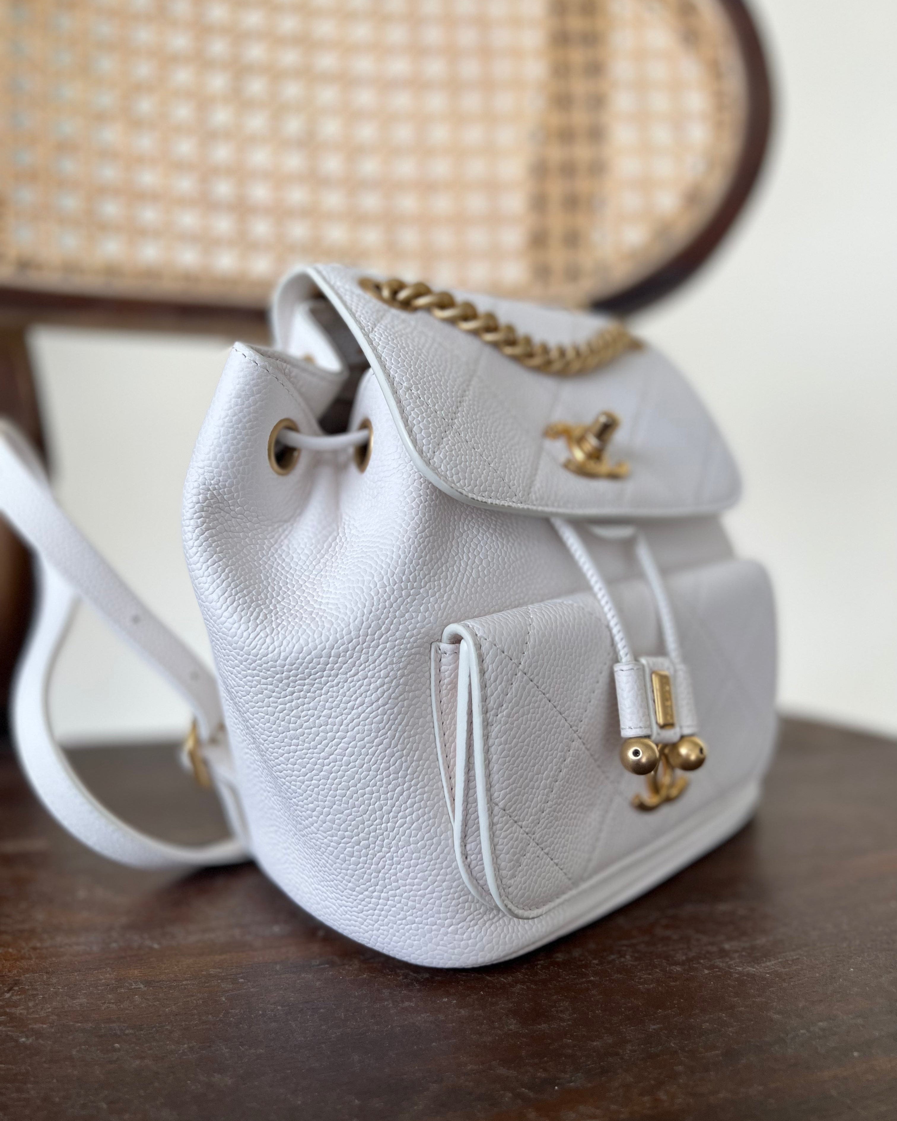 CHANEL Backpack White Caviar Quilted BackPack w/ Aged Gold Hardware - Redeluxe