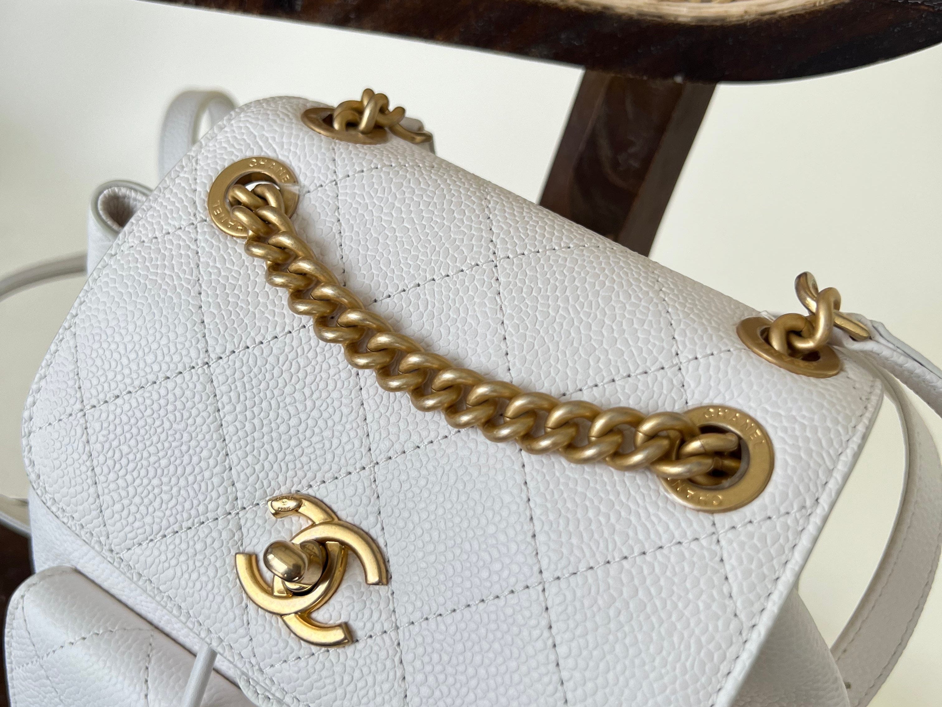CHANEL Backpack White Caviar Quilted BackPack w/ Aged Gold Hardware - Redeluxe