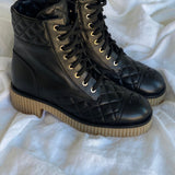 CHANEL Boots CHANEL 21B Calfskin Quilted Black Caviar Quilted CC Logo Combat Boots - Redeluxe