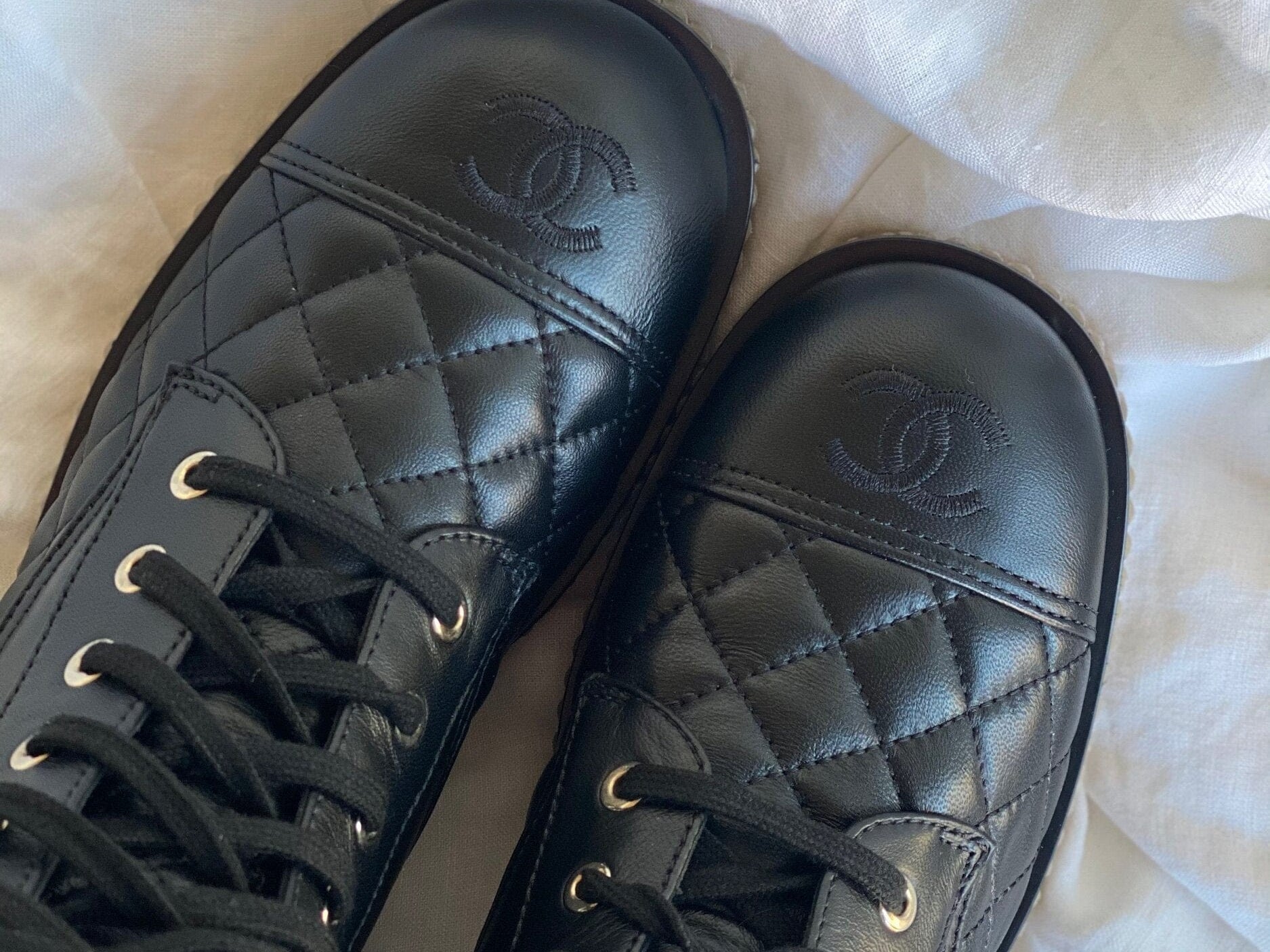 CHANEL Boots CHANEL 21B Calfskin Quilted Black Caviar Quilted CC Logo Combat Boots - Redeluxe