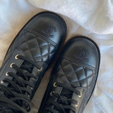 CHANEL Boots CHANEL 21B Calfskin Quilted Black Caviar Quilted CC Logo Combat Boots - Redeluxe