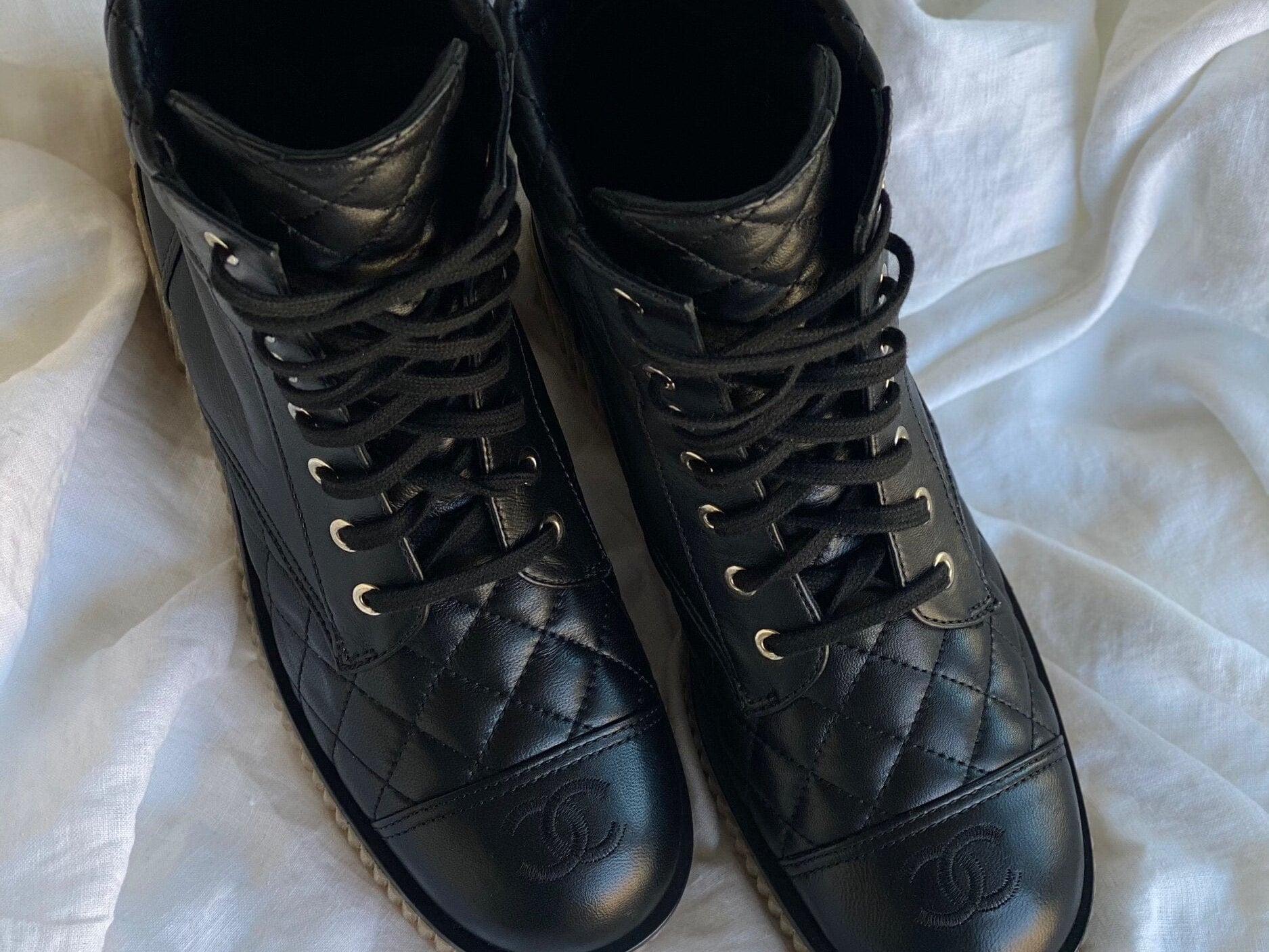 CHANEL Boots CHANEL 21B Calfskin Quilted Black Caviar Quilted CC Logo Combat Boots - Redeluxe