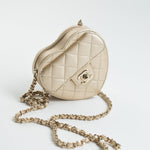 CHANEL Clutch Gold 22S CC In Love Metallic Gold Lambskin Quilted Small (Clutch on Chain) Heart Bag LGHW - Redeluxe
