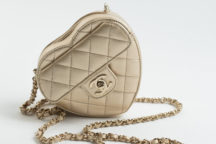 CHANEL Clutch Gold 22S CC In Love Metallic Gold Lambskin Quilted Small (Clutch on Chain) Heart Bag LGHW - Redeluxe