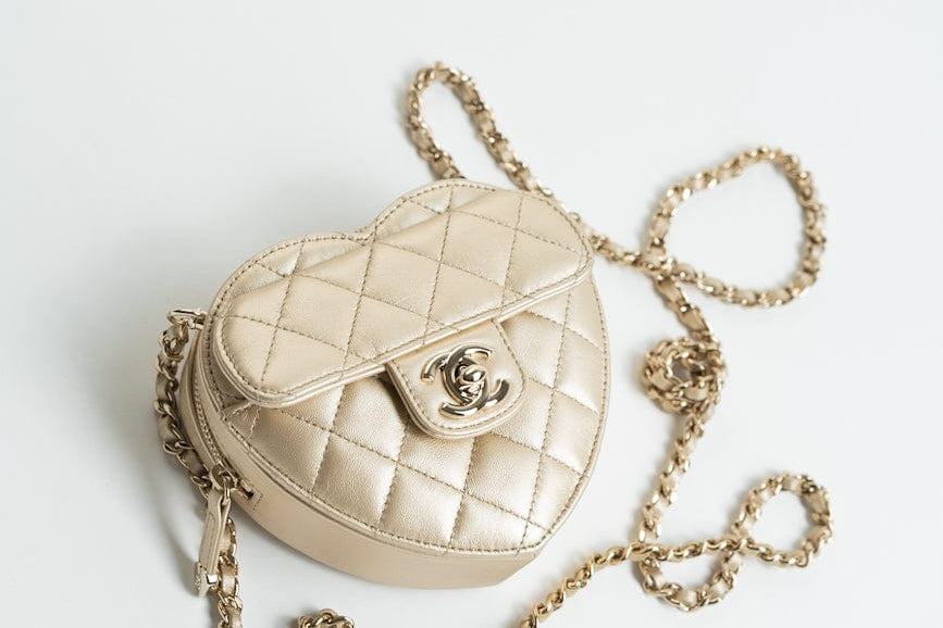 CHANEL Clutch Gold 22S CC In Love Metallic Gold Lambskin Quilted Small (Clutch on Chain) Heart Bag LGHW - Redeluxe
