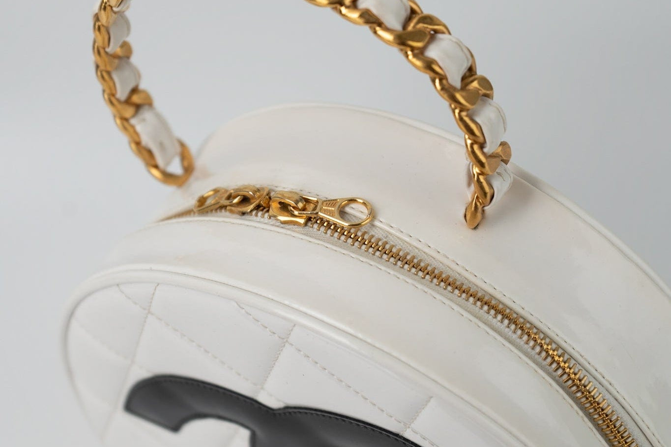CHANEL Cosmetic Cases Vintage White Patent Leather Round Vanity Bag Gold Hardware - Redeluxe